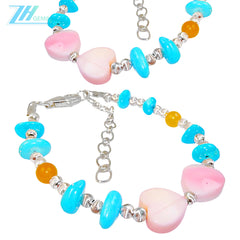 Made Of S925 Silver And Natural Turquoise This Bracelet Is Decorated With A Pink Opal Heart Shaped Pendant It's Delicate