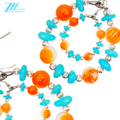 Sterling treatment Turquoise and natural Orange spiny oyster combine to form earrings With a unique shape they are like a beautiful dream blooming by the ear swaying gracefully