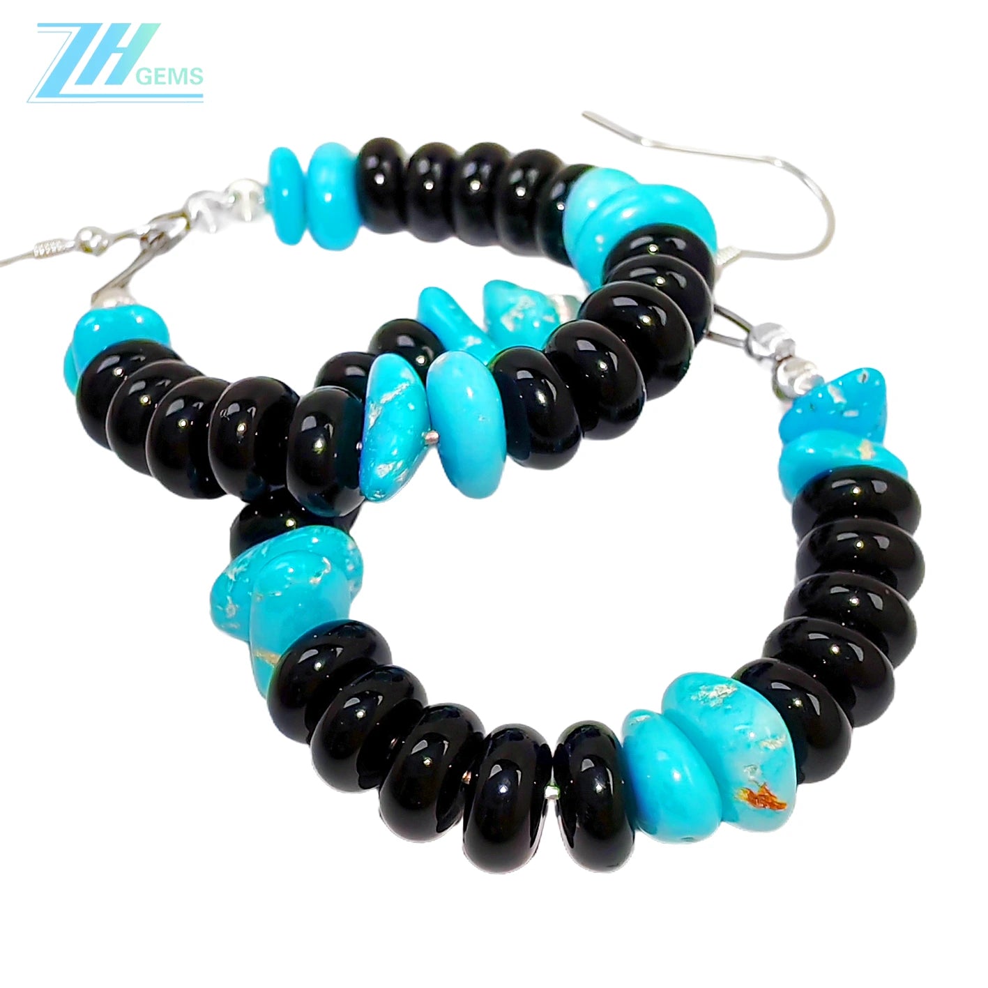 Natural Obsidian and natural Sterling treatment Turquoise form gemstone earrings They are small and delicate adding a mysterious and unique color to the ears