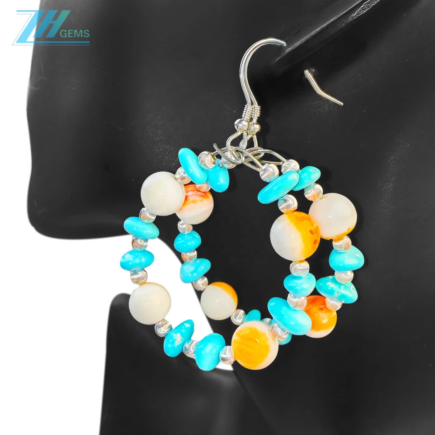 Sterling treatment Turquoise and natural Orange spiny oyster combine to form earrings With a unique shape they are like a beautiful dream blooming by the ear swaying gracefully