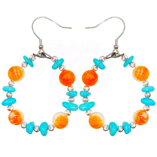 Sterling treatment Turquoise and natural Orange spiny oyster combine to form earrings With a unique shape they are like a beautiful dream blooming by the ear swaying gracefully