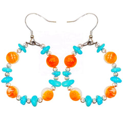 Sterling treatment Turquoise and natural Orange spiny oyster combine to form earrings With a unique shape they are like a beautiful dream blooming by the ear swaying gracefully